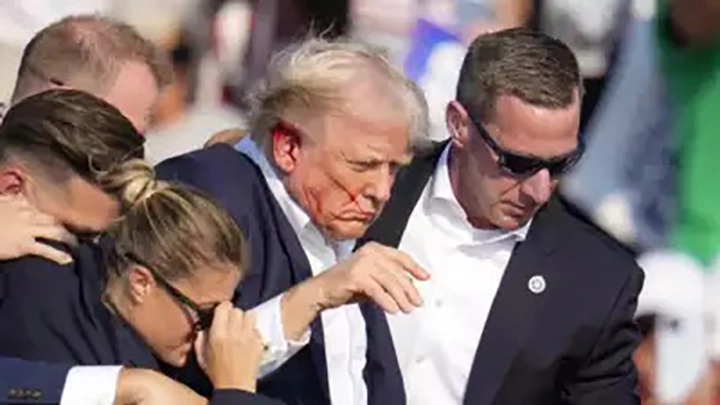 Donald Trump shot at during rally; suspected shooter and one attendee dead